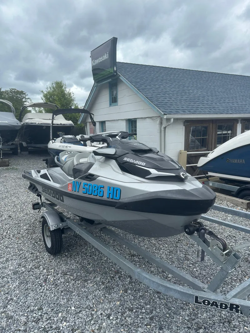 Slide: The Image of 2020 Sea-Doo GTX Limited 300 on trailer, parked outside a dealership. - 5