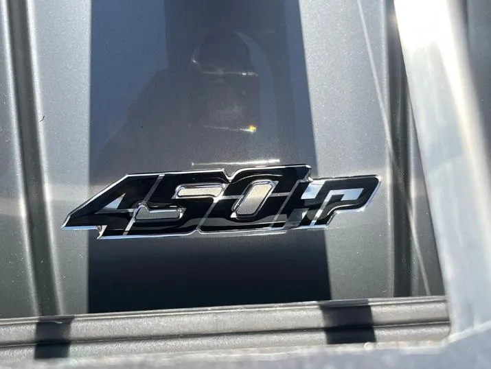 Slide: The Image of 2025 Supreme S240 emblem displaying 450 horsepower on sleek metallic surface. - 10