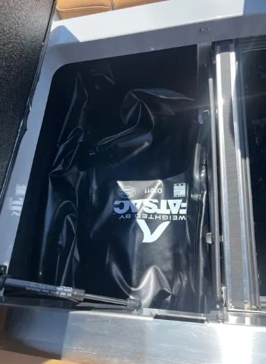 Slide: The Image of 2025 Supreme S240 boat ballast system with FatSac weight bag. - 11