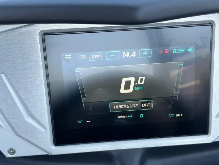Slide: The Image of Dashboard display of a 2025 Supreme S240 boat showing speed and settings. - 14