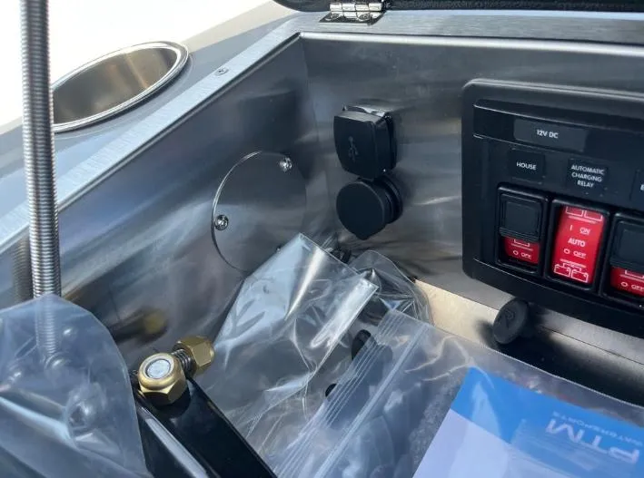 Slide: The Image of Control panel of 2025 Supreme S240 with switches and connectors in a metal enclosure. - 23