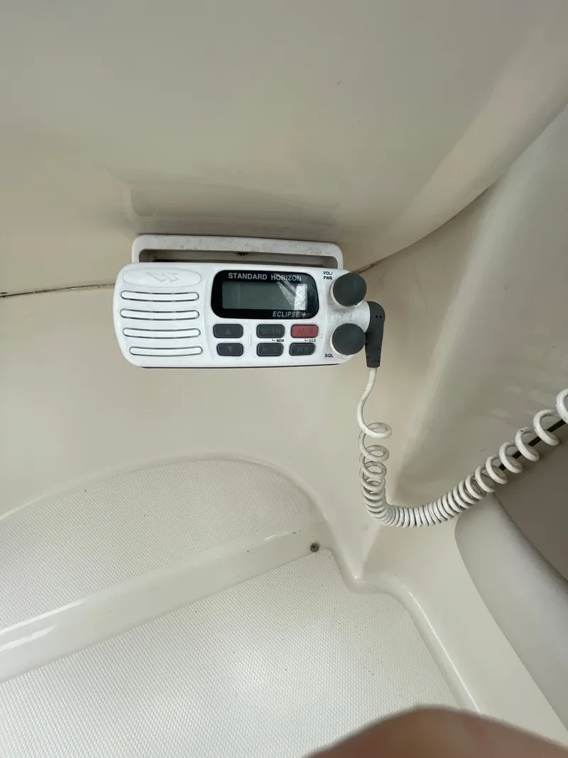 Slide: The Image of VHF radio installed on a 2004 Sea Ray 220 Sundeck boat. - 4