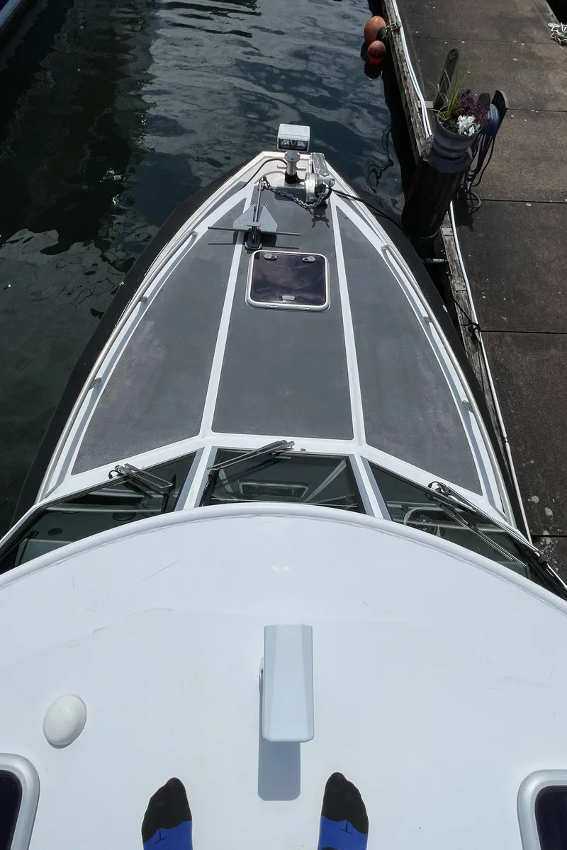 Slide: The Image of Aerial view of 2007 Titan T-300 boat docked at marina. - 13