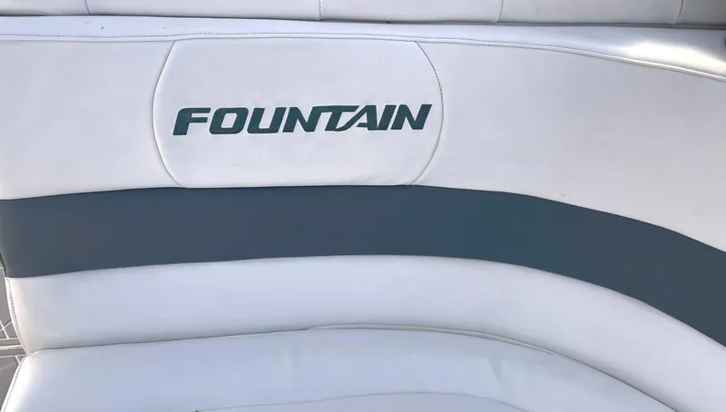 Slide: The Image of 2002 Fountain 38 Express Cruiser boat seat with logo. - 7