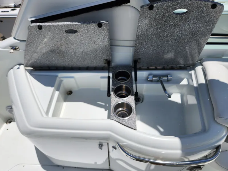Slide: The Image of 2007 Formula 330 Sun Sport boat interior with cup holders and storage compartments. - 17