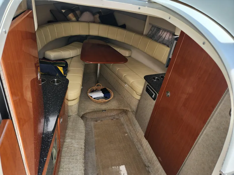 Slide: The Image of Interior of 2007 Formula 330 Sun Sport boat with seating and table. - 20