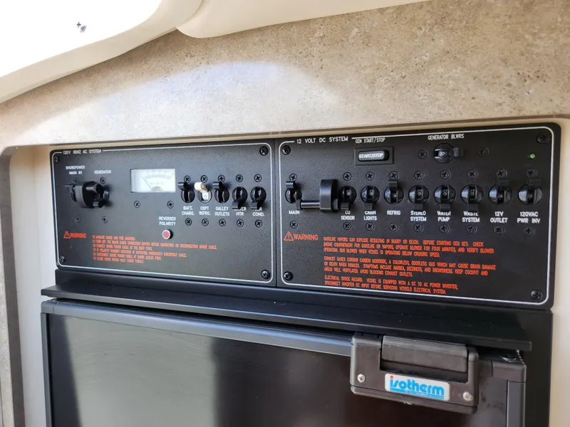 Slide: The Image of Control panel of a 2007 Formula 330 Sun Sport boat with Isotherm refrigerator. - 28