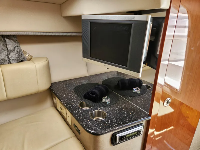 Slide: The Image of Interior of 2007 Formula 330 Sun Sport with TV and seating area. - 30