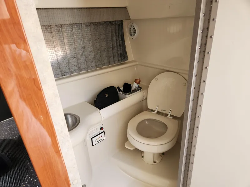 Slide: The Image of 2007 Formula 330 Sun Sport boat bathroom with toilet and sink. - 31