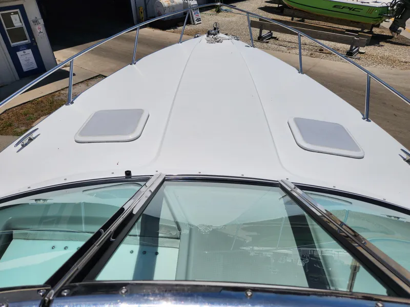 Slide: The Image of 2007 Formula 330 Sun Sport boat deck with hatches and railing. - 33
