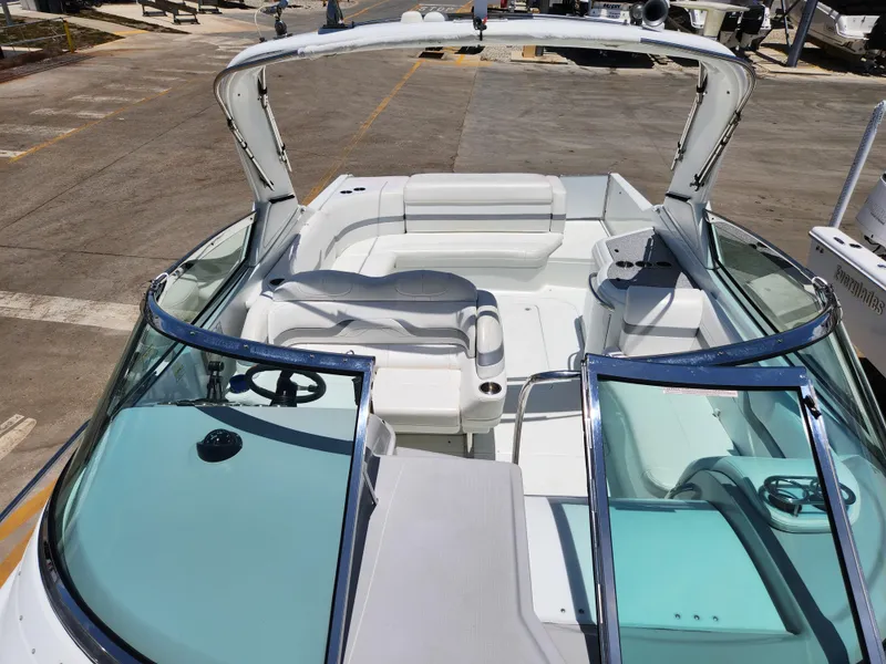 Slide: The Image of 2007 Formula 330 Sun Sport boat interior with white seating and open cockpit. - 34