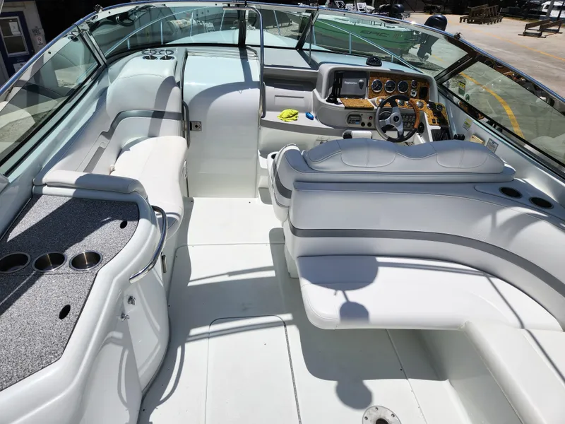 Slide: The Image of 2007 Formula 330 Sun Sport boat interior with sleek seating and modern dashboard. - 7