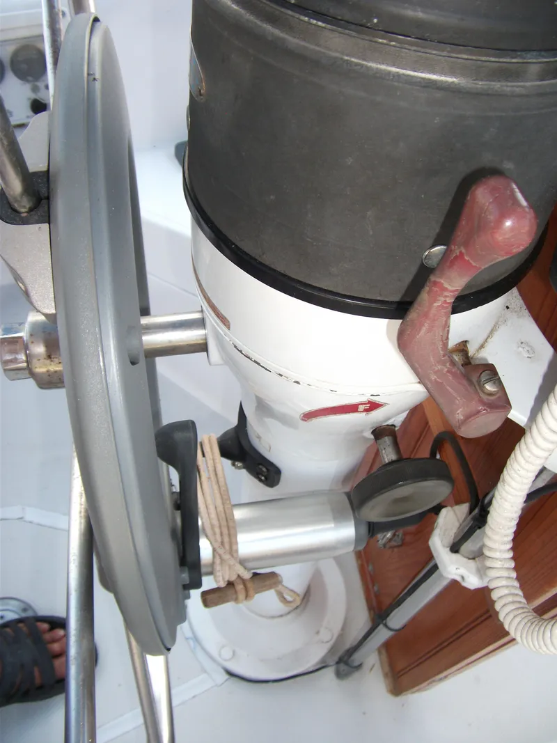 Slide: The Image of Steering wheel and controls of a 1992 Catalina 30 MkII sailboat. - 36