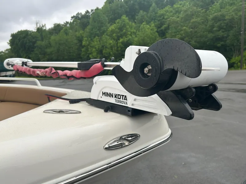 Slide: The Image of 2023 Skeeter SX 2250 boat with Minn Kota Terrova trolling motor, parked outdoors. - 7