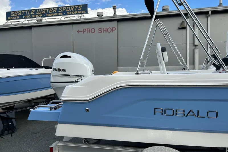 Slide: The Image of 2026 Robalo R160 Center Console boat with Yamaha engine at Seattle Water Sports. - 28