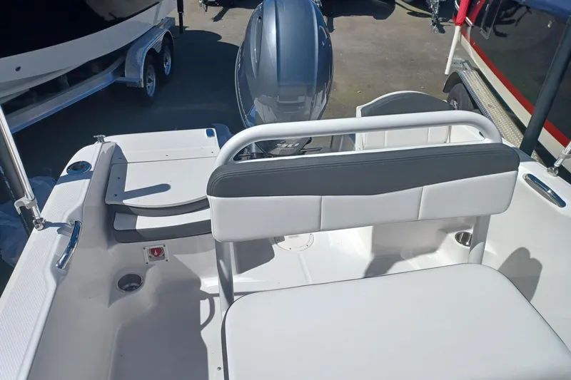 Slide: The Image of 2026 Robalo R160 Center Console boat on trailer at Seattle Water Sports. - 5