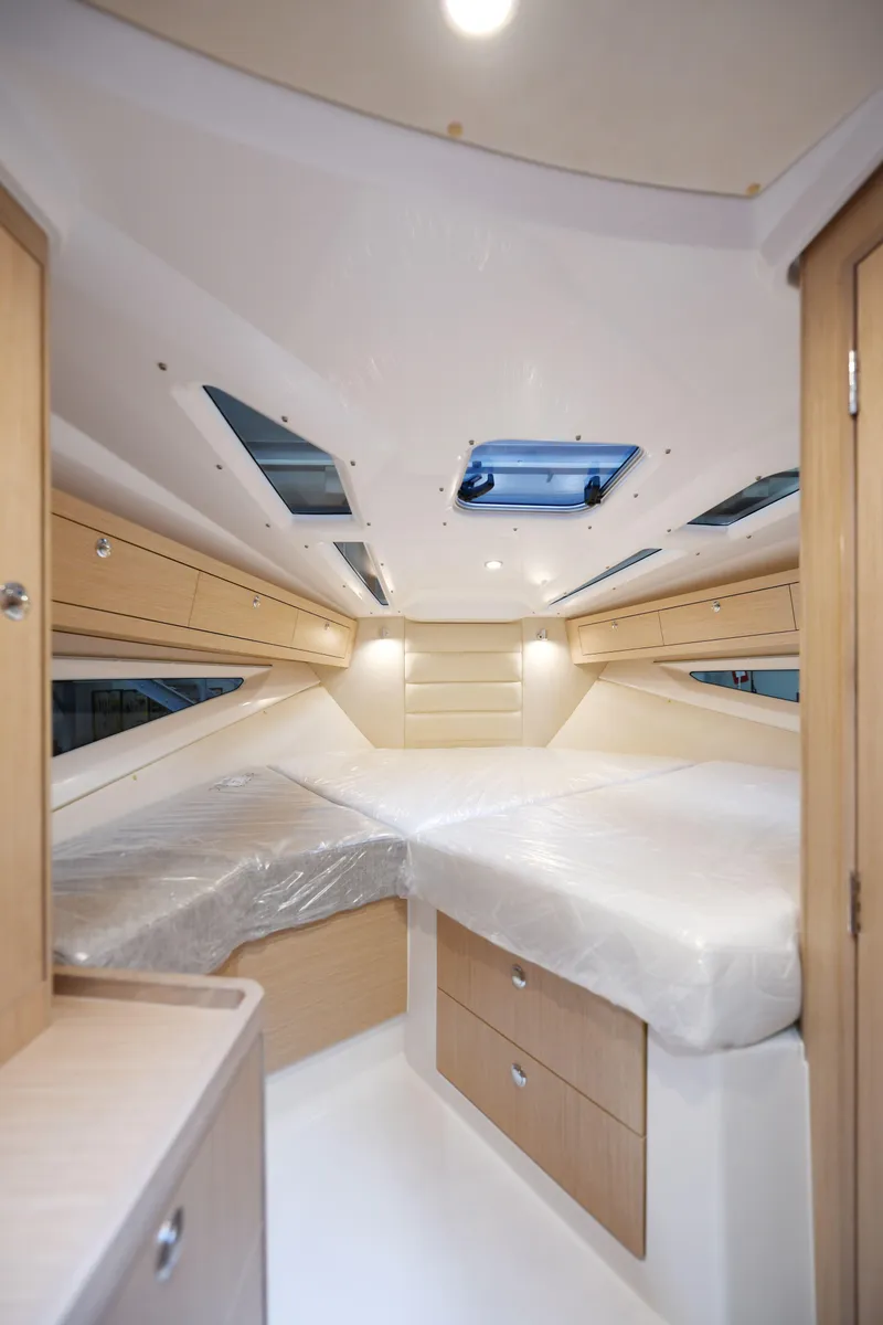 Slide: The Image of Luxurious interior of 2023 Hussar 850 yacht with modern design and ample natural light. - 9