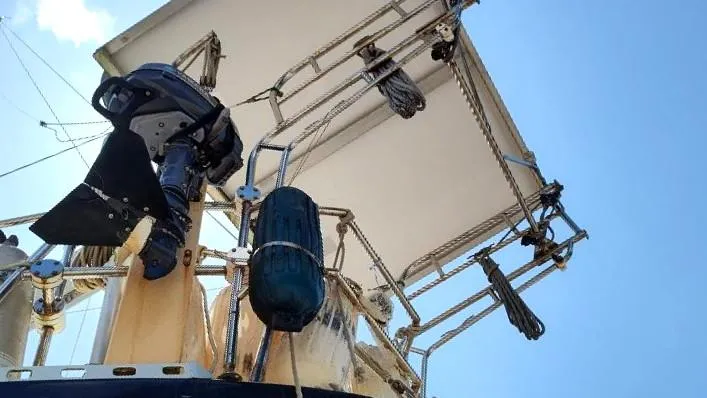 Slide: The Image of Sailboat rigging and equipment on a 1985 Tayana Vancover 42 against a clear blue sky. - 10