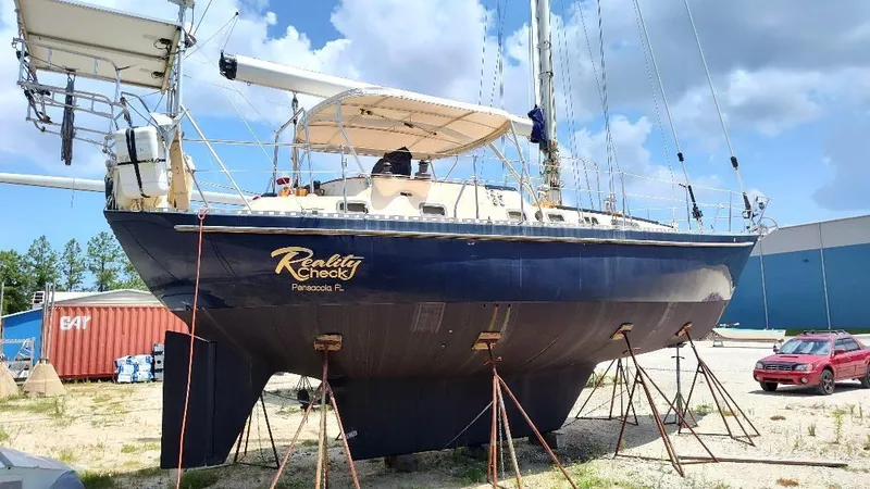 Slide: The Image of 1985 Tayana Vancover 42 sailboat on stands, "Reality Check," Pensacola, Florida. - 5