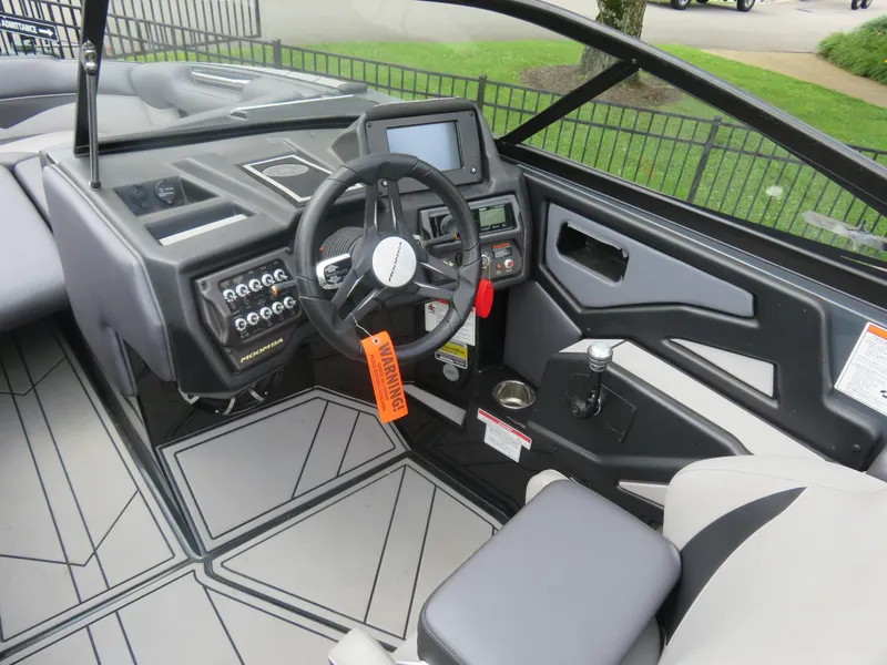 Slide: The Image of 2020 Moomba Makai boat interior with modern dashboard and steering wheel. - 6