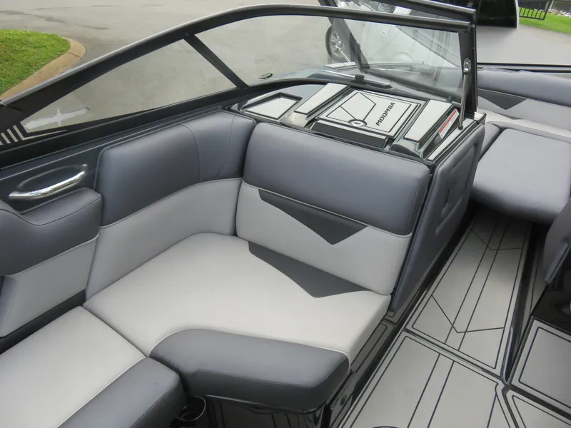 Slide: The Image of 2020 Moomba Makai boat interior with gray seating and sleek design. - 7