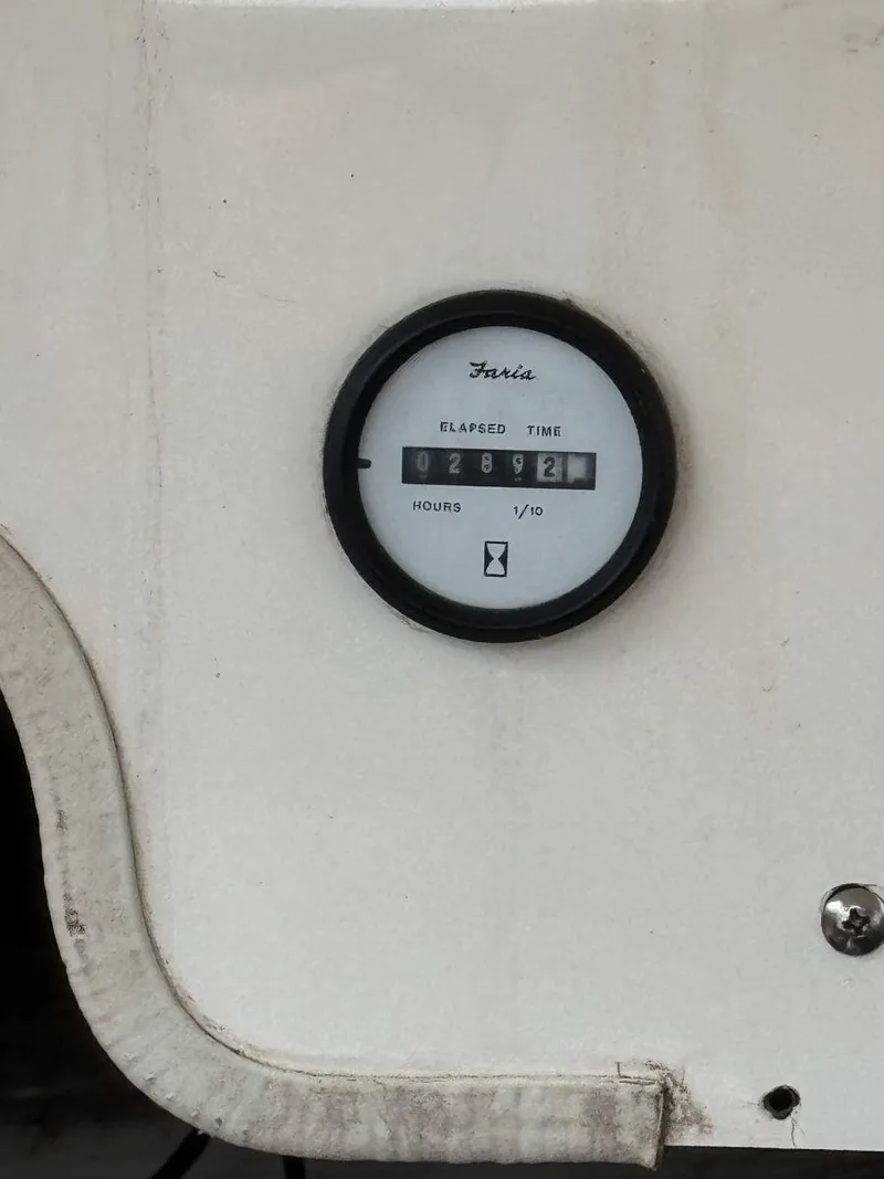 Slide: The Image of Hour meter on 2006 Glastron GX 235 boat, displaying elapsed time. - 12