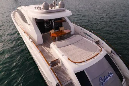 Slide: The Image of Luxurious 2007 Lazzara LSX 75 yacht cruising on calm waters, featuring spacious deck and elegant design. - 11