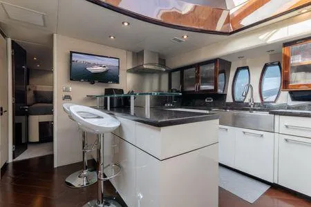 Slide: The Image of Luxurious kitchen interior of 2007 Lazzara LSX 75 yacht with modern design and sleek finishes. - 20