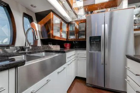 Slide: The Image of Luxurious kitchen interior of 2007 Lazzara LSX 75 yacht with stainless steel appliances. - 23