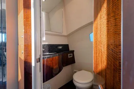Slide: The Image of Luxurious bathroom interior on 2007 Lazzara LSX 75 yacht with wood accents and modern fixtures. - 33