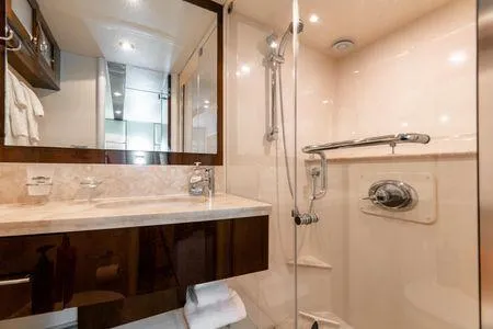 Slide: The Image of Luxurious bathroom in 2007 Lazzara LSX 75 yacht with modern fixtures and elegant design. - 42