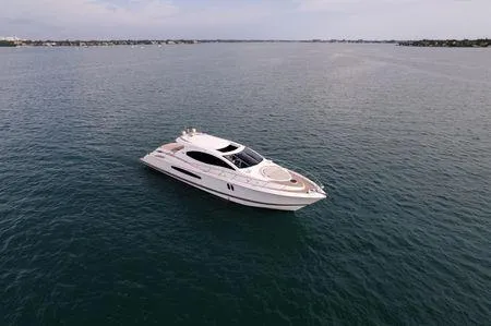 Slide: The Image of Luxury 2007 Lazzara LSX 75 yacht cruising on open water. - 5