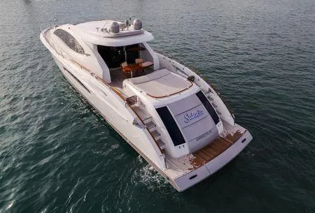 Slide: The Image of 2007 Lazzara LSX 75 yacht cruising on open water, rear view. - 9