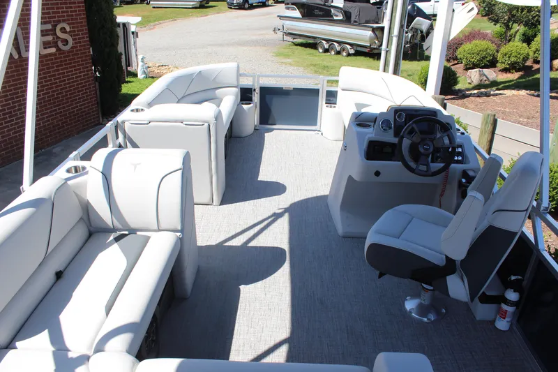Slide: The Image of 2025 Tahoe Pontoon Sport 85 Versatile Rear Bench interior with spacious seating and modern helm. - 7