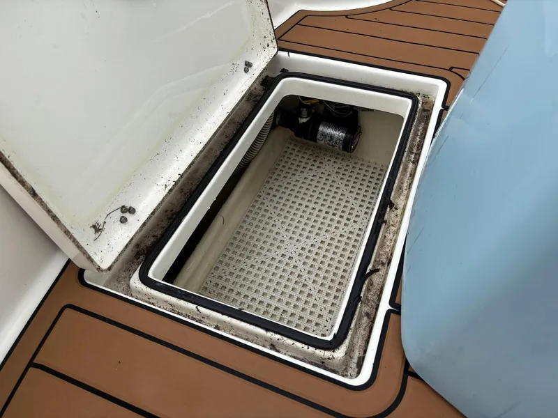 Slide: The Image of Open storage compartment on 2020 Pathfinder 2600 HPS boat deck. - 7