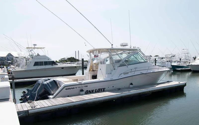 Slide: The Image of 2006 Grady-White Express 360 boat docked at marina, side view. - 3