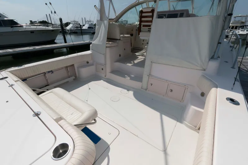 Slide: The Image of 2006 Grady-White Express 360 boat interior with seating and storage at marina. - 6
