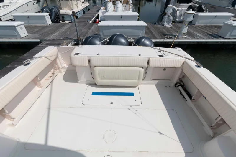 Slide: The Image of 2006 Grady-White Express 360 boat deck with seating, docked at marina. - 8