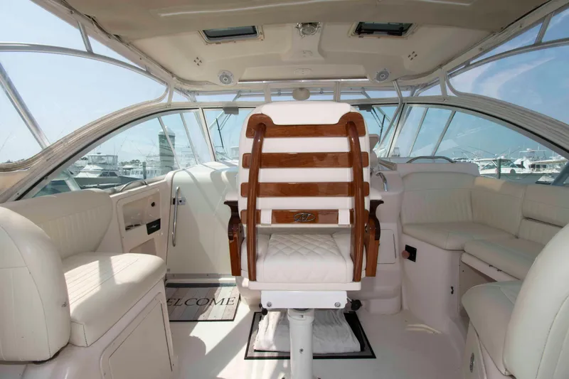 Slide: The Image of 2006 Grady-White Express 360 boat interior with luxurious seating and helm. - 9