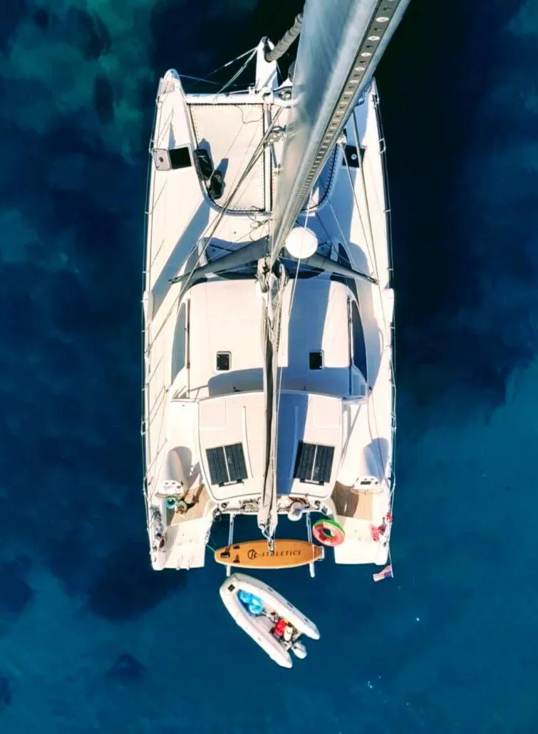Slide: The Image of Aerial view of 2011 Performance Catamarans 52 on clear blue water. - 15