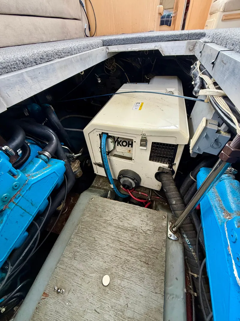 Slide: The Image of Engine compartment of a 1997 Carver 355 Aft Cabin with Kohler generator. - 23