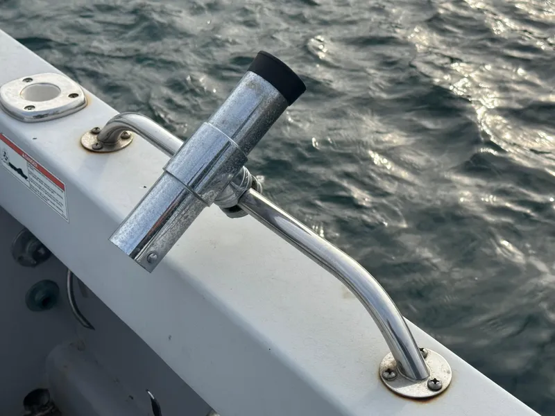 Slide: The Image of Chrome rod holder on Radon 26 boat, 1987, with ocean background. - 18