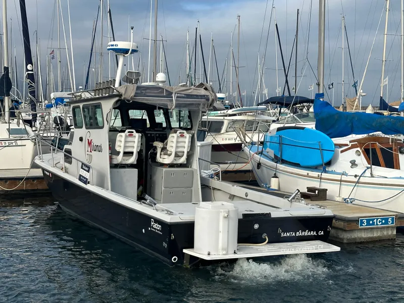 Slide: The Image of 1987 Radon 26 boat docked in marina, Santa Barbara, CA, surrounded by sailboats. - 3