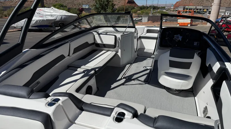Slide: The Image of 2025 Yamaha Boats AR195 interior with sleek seating and modern design. - 24