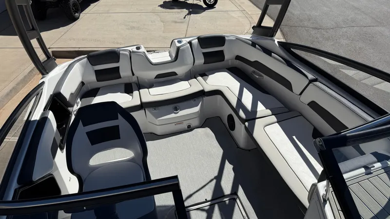 Slide: The Image of 2025 Yamaha Boats AR195 interior with sleek seating and modern design. - 26