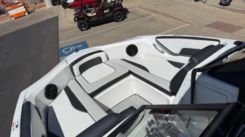 Slide: The Image of 2025 Yamaha Boats AR195 interior with sleek seating and modern design. - 42