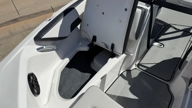 Slide: The Image of 2025 Yamaha Boats AR195 interior seating and storage area, featuring sleek design and modern materials. - 44