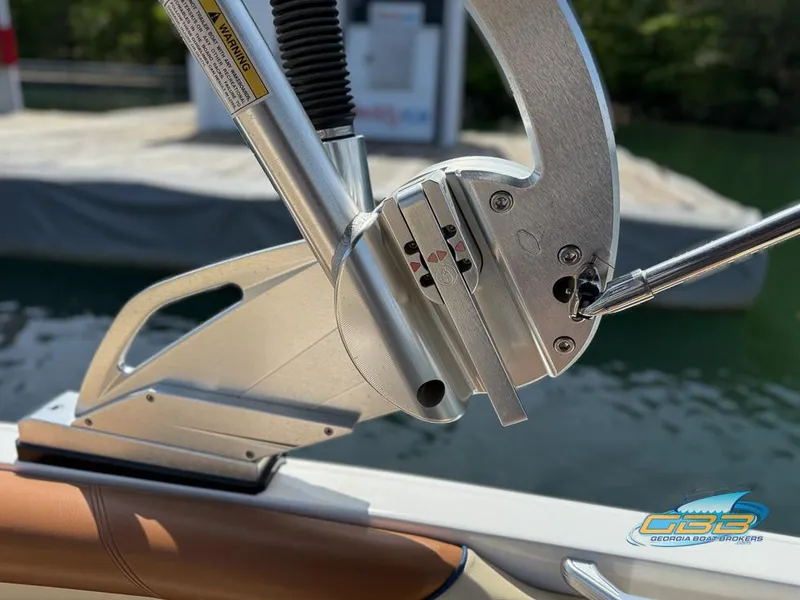 Slide: The Image of Close-up of 2013 MasterCraft X-45 boat tower mechanism by the water. - 19