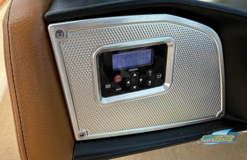 Slide: The Image of Control panel of a 2013 MasterCraft X-45 boat with Clarion audio system. - 27