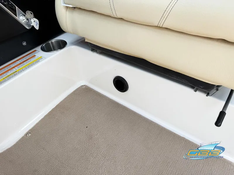 Slide: The Image of Interior of 2013 MasterCraft X-45 boat with beige seating and carpeted floor. - 28